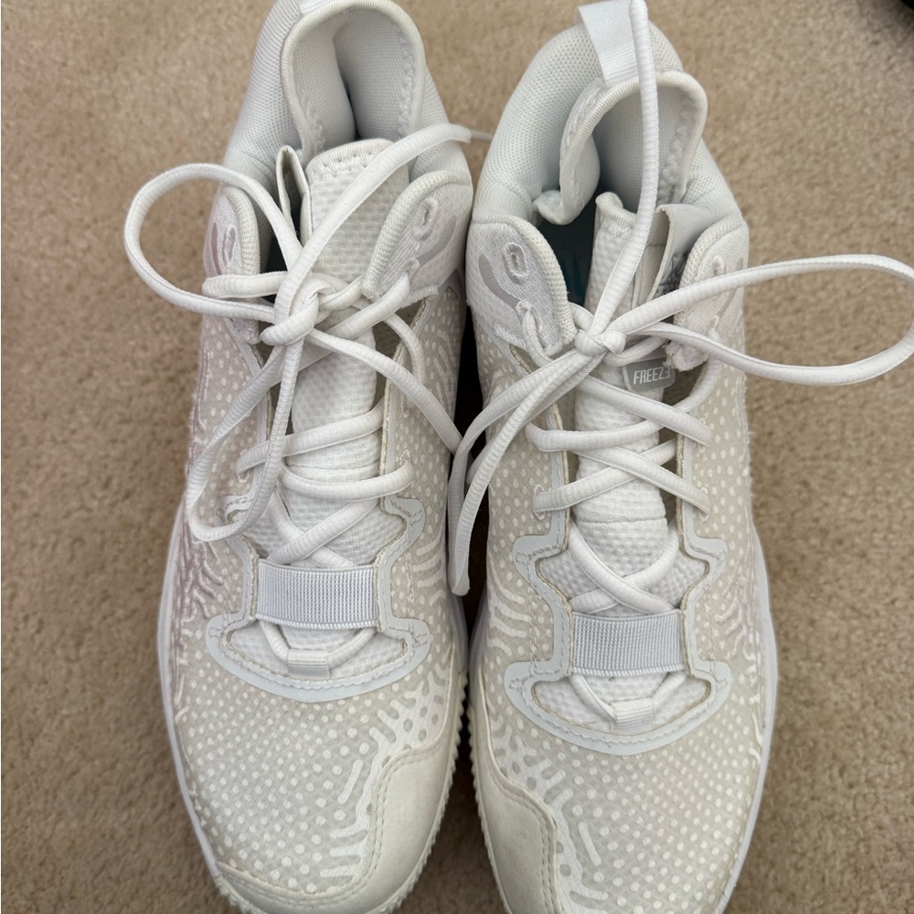 Women's White New Balance Turf Shoes
